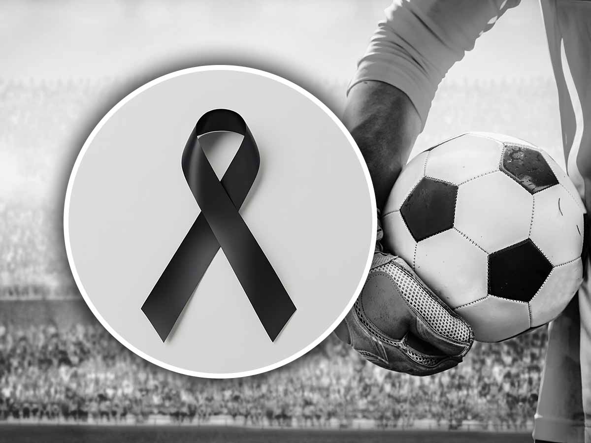 simbolo del lutto con vicino un pallone